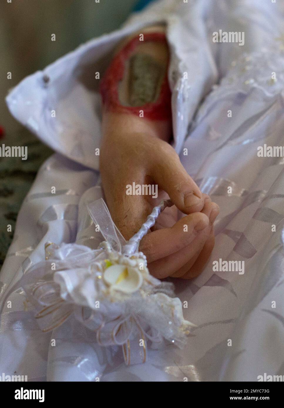 A molded wax and cloth figure of Saint Felicitas of Rome, with a glass