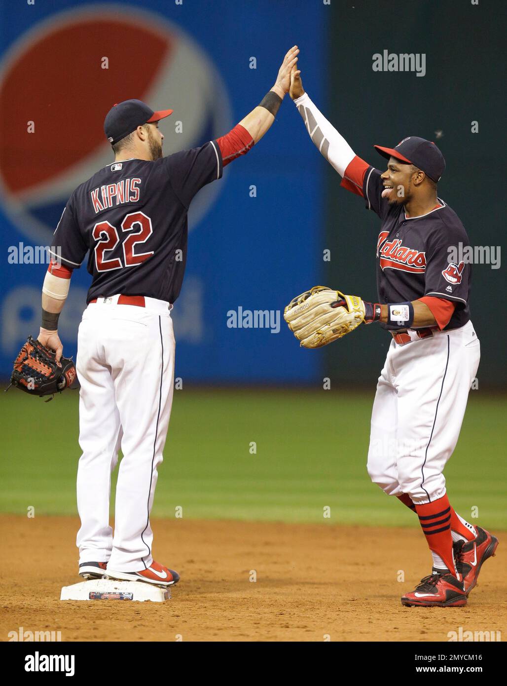 Cleveland Indians' Jason Kipnis, left, and Rajai Davis celebrate