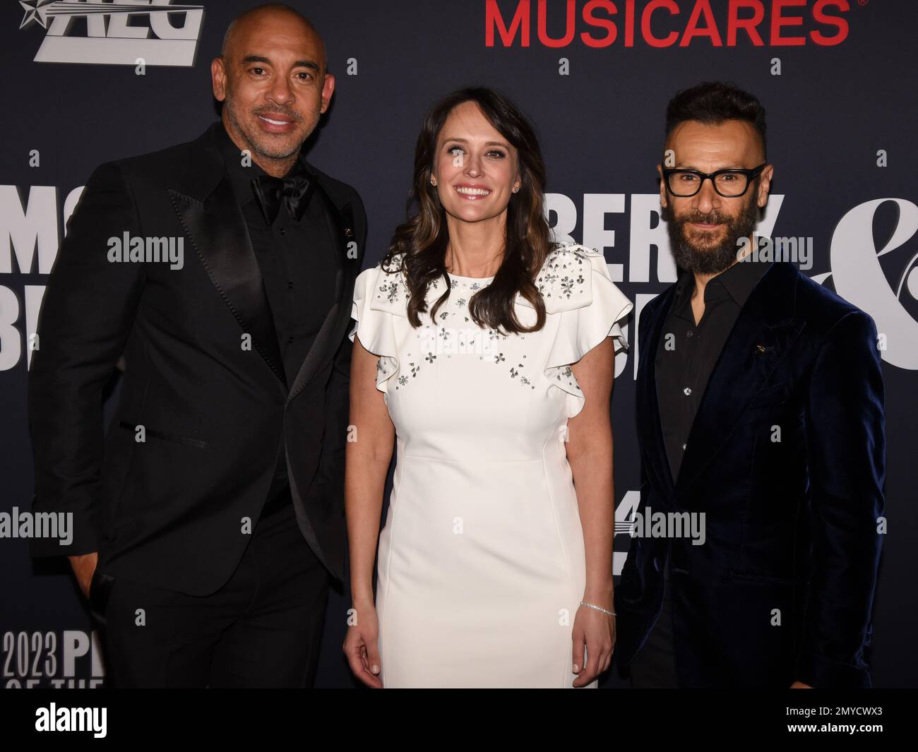 February 3, 2023, Los Angeles, California, United States: (L-R) CEO of the Recording Academy and MusiCares Harvey Mason jr., MusiCares Executive Director Laura Segura, and Recording Academy President Panos A. Panay attend the 2023 MusiCares Persons Of The Year Honoring Berry Gordy And Smokey Robinson. (Credit Image: © Billy Bennight/ZUMA Press Wire) EDITORIAL USAGE ONLY! Not for Commercial USAGE! Stock Photo