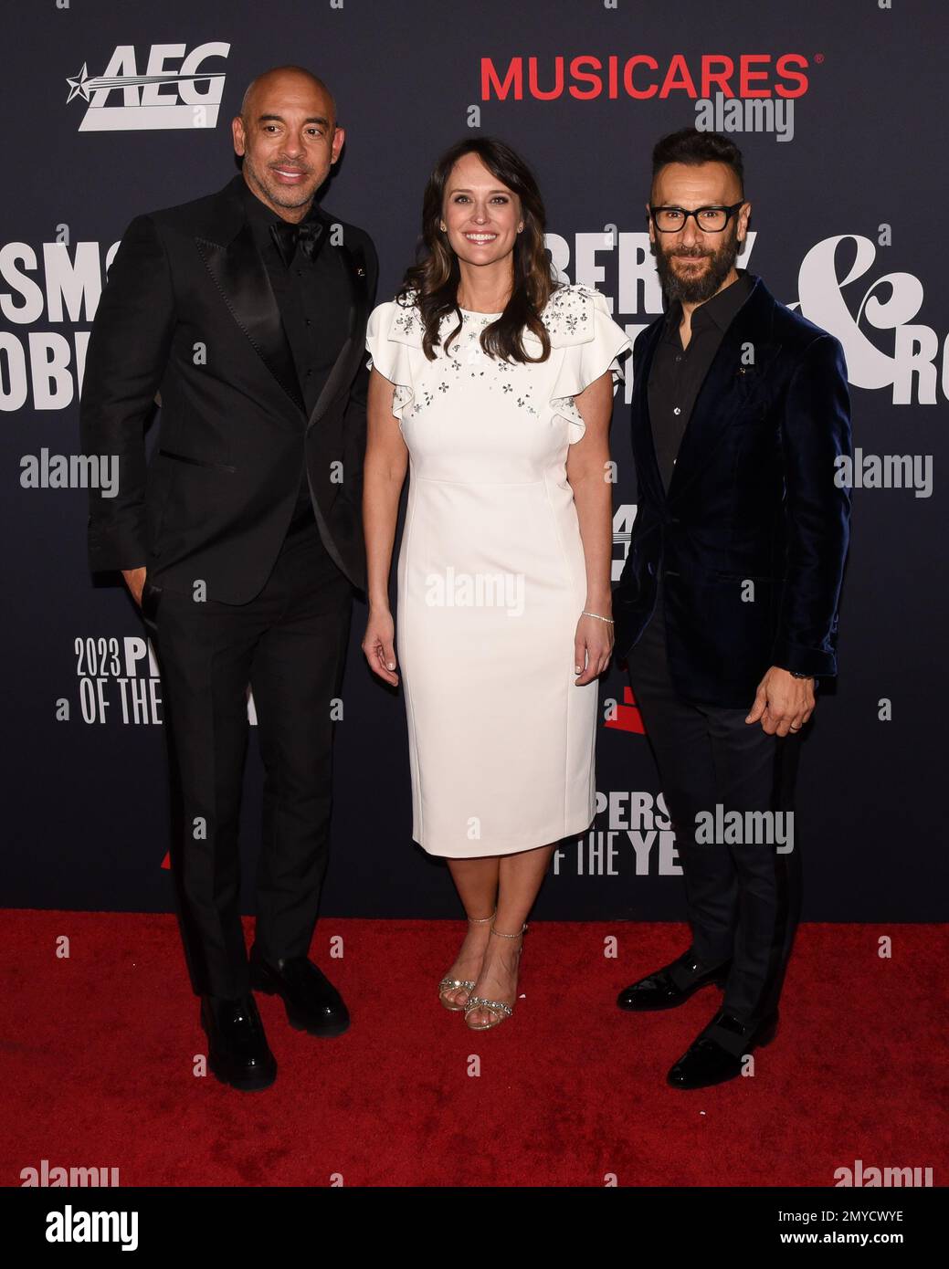February 3, 2023, Los Angeles, California, United States: (L-R) CEO of the Recording Academy and MusiCares Harvey Mason jr., MusiCares Executive Director Laura Segura, and Recording Academy President Panos A. Panay attend the 2023 MusiCares Persons Of The Year Honoring Berry Gordy And Smokey Robinson. (Credit Image: © Billy Bennight/ZUMA Press Wire) EDITORIAL USAGE ONLY! Not for Commercial USAGE! Stock Photo