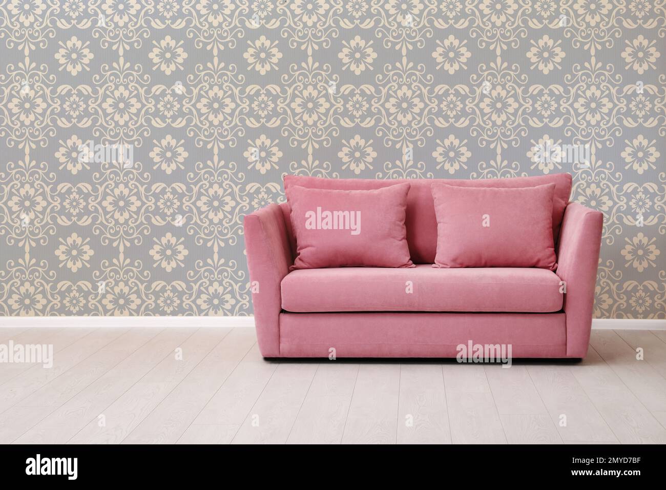 Modern sofa near patterned wallpapers. Interior design Stock Photo Alamy