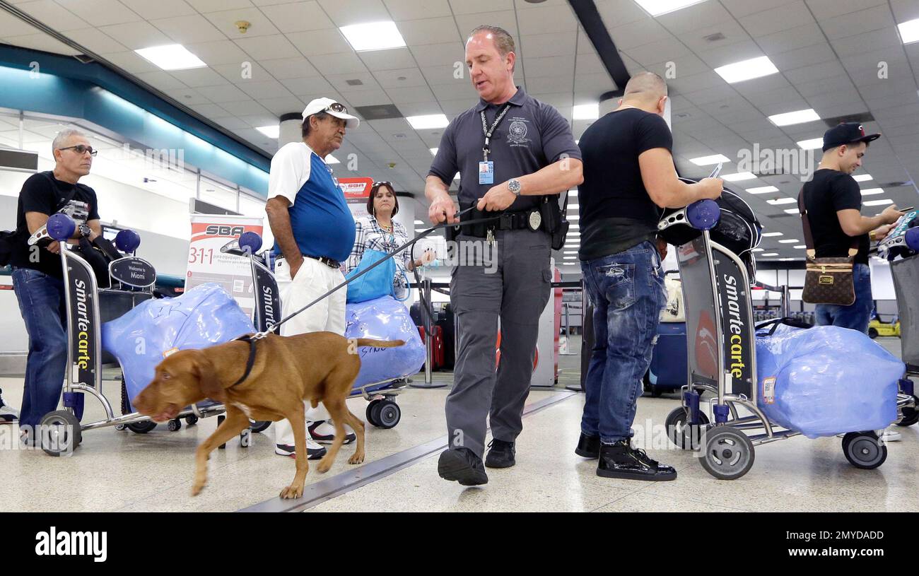 In this photo taken Thursday, June 30, 2016, Miami-Dade Police officer ...