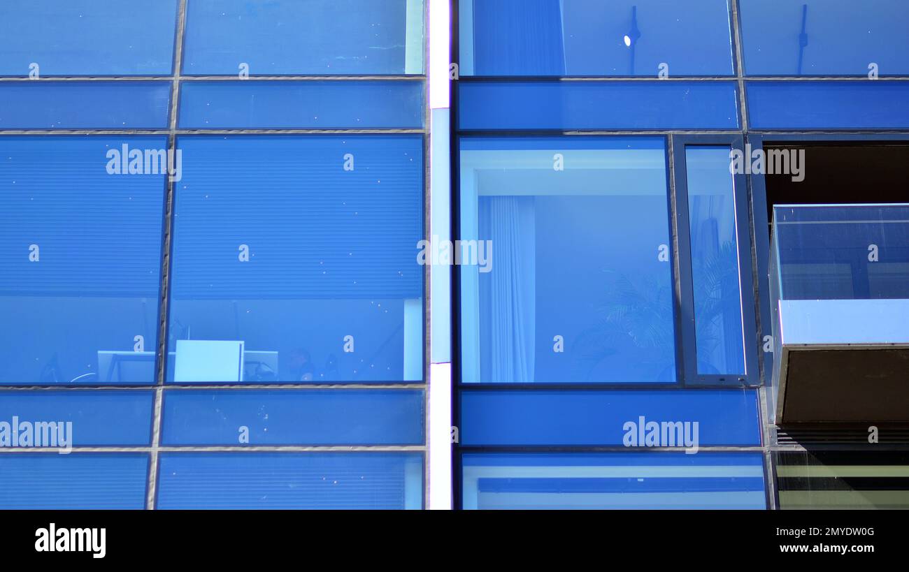 Abstract fragment of contemporary architecture, walls made of glass and