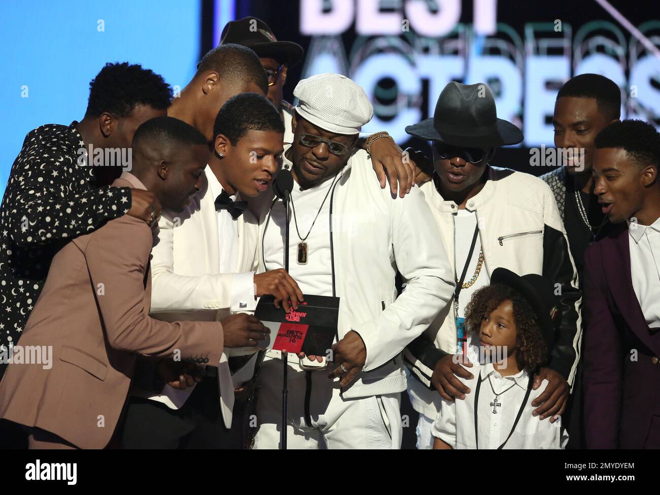 Bobby Brown, center, and the cast of New Edition present the award for best actress at the BET Awards at the Microsoft Theater on Sunday, June 26, 2016, in Los Angeles. (Photo by Matt Sayles/Invision/AP) Stock Photo