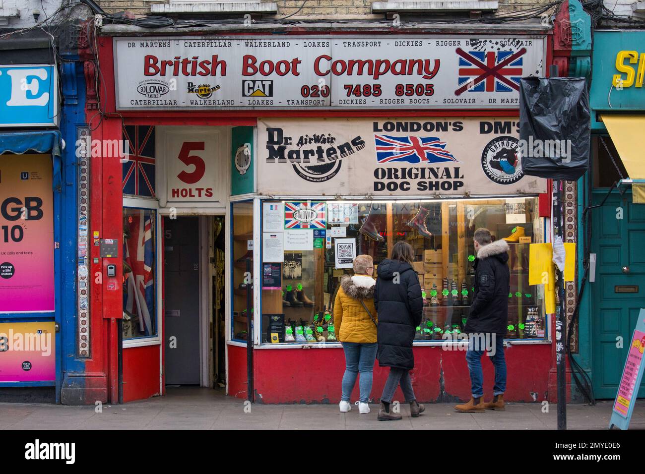 Dr.Martens British Boot Company Camden Market London people looking at DM's  Stock Photo - Alamy