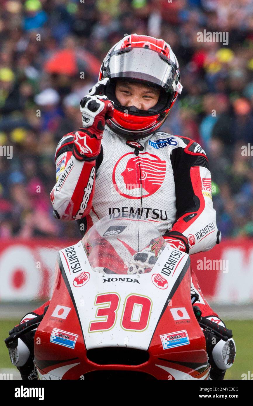 Moto2 rider Takaaki Nakagami of Japan celebrates winning the Moto2