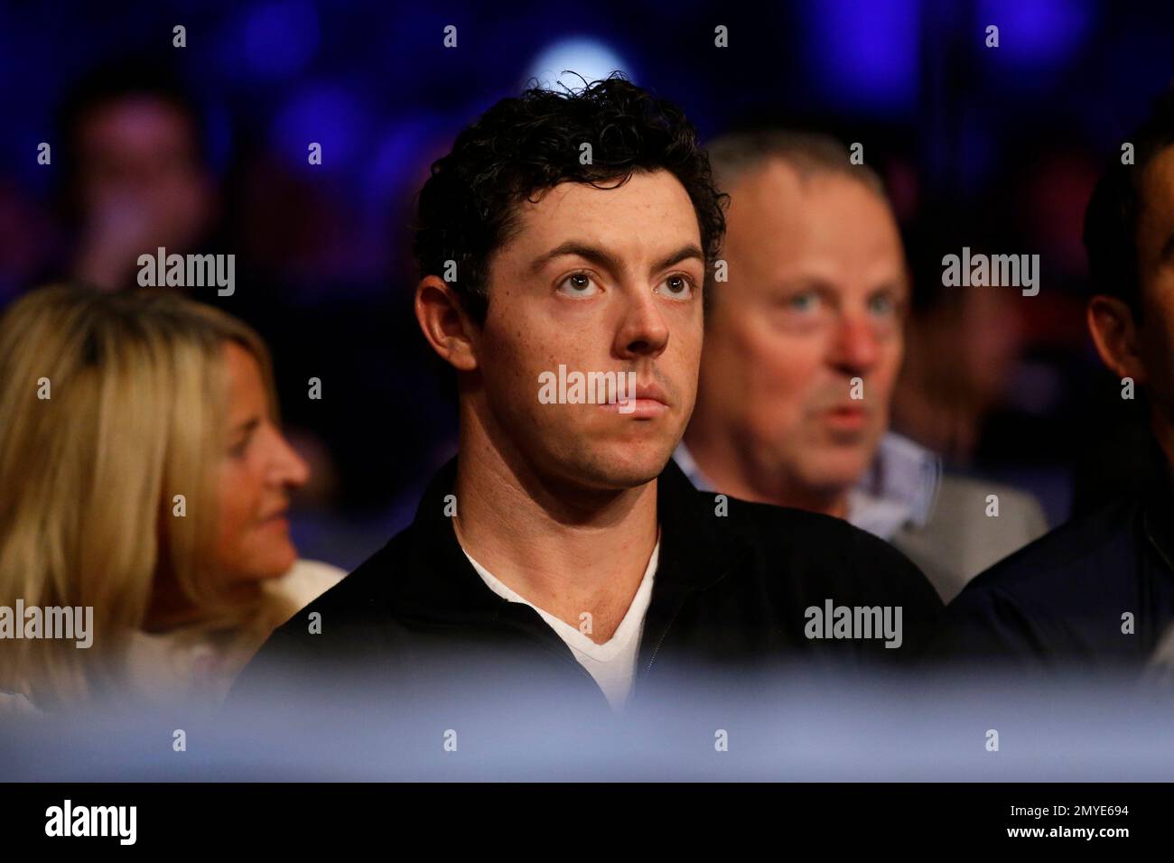 British golfer Rory McIlroy sits ringside several fights before Anthony ...