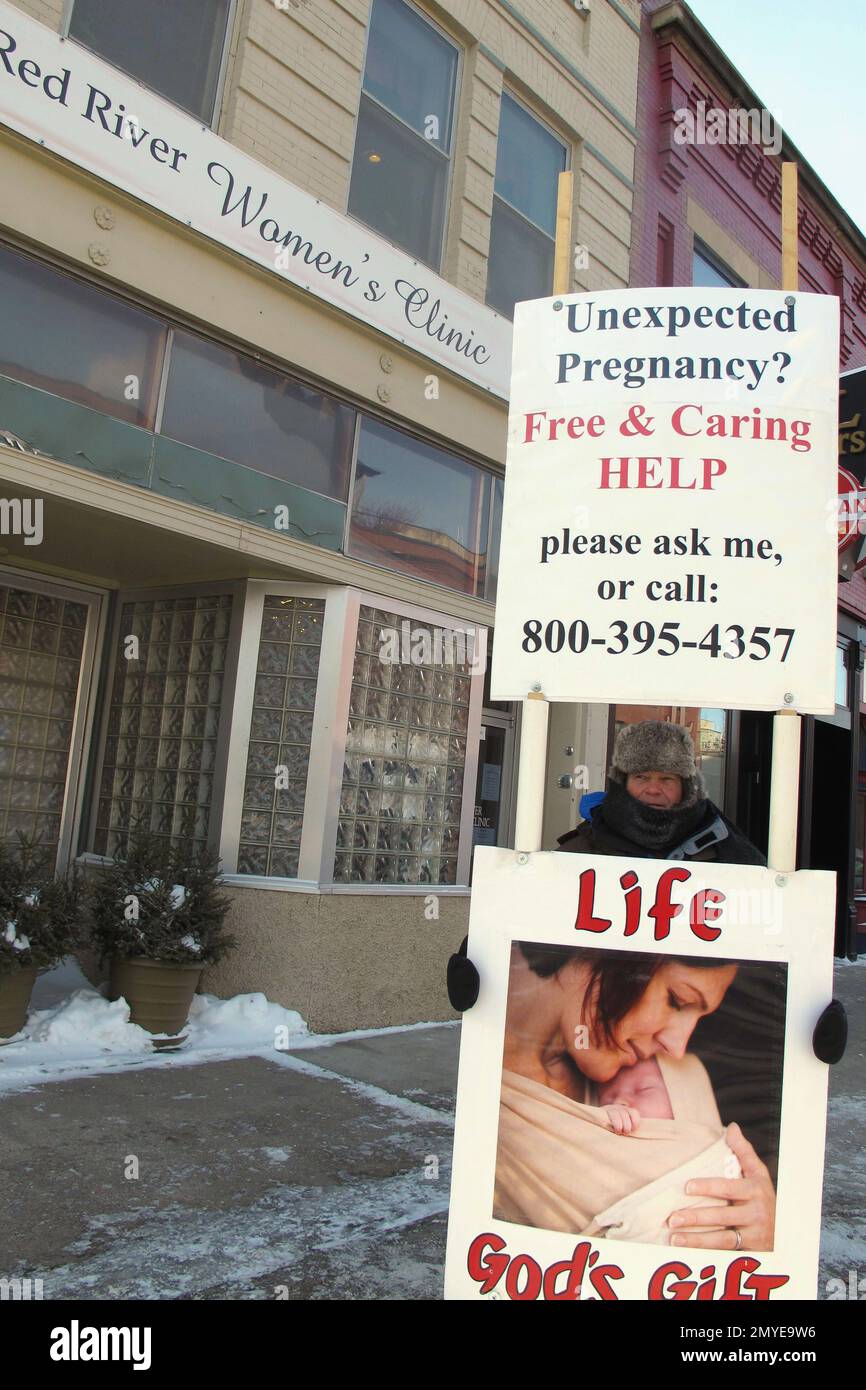 FILE In this Feb. 20, 2013 file photo, an abortion protester stands
