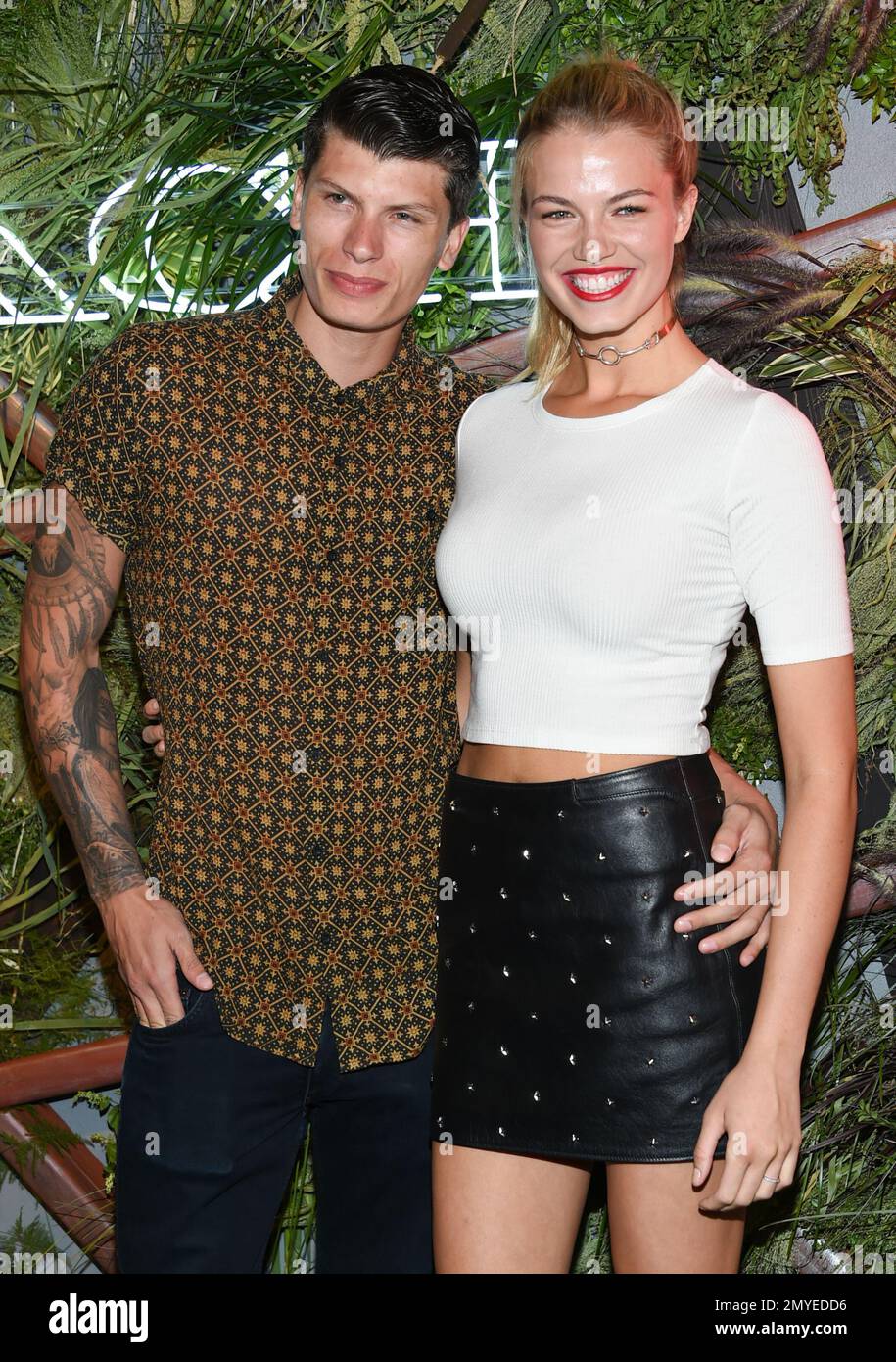 Model Hailey Clauson, right, and boyfriend Julian Herrera attend the