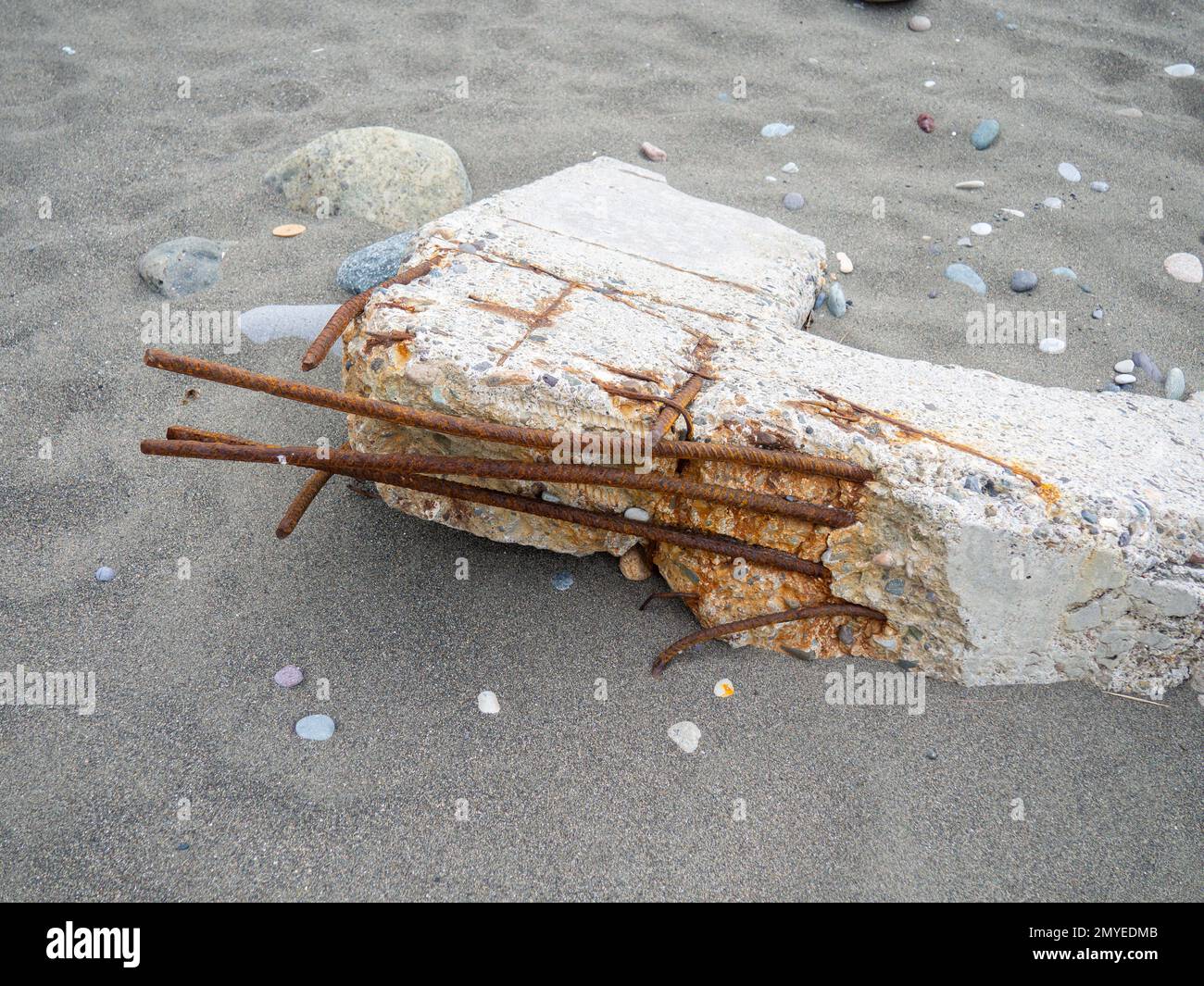 Concrete Rusted Material Reinforced concrete. Destroyed building material. Rusty iron ...