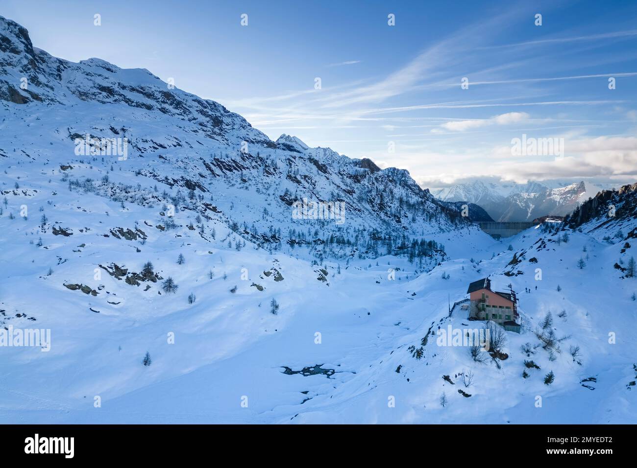 View of the Rifugio Calvi and Fregabolgia lake in winter. Carona, Val Brembana, Alpi Orobie, Bergamo, Bergamo Province, Lombardy, Italy, Europe. Stock Photo