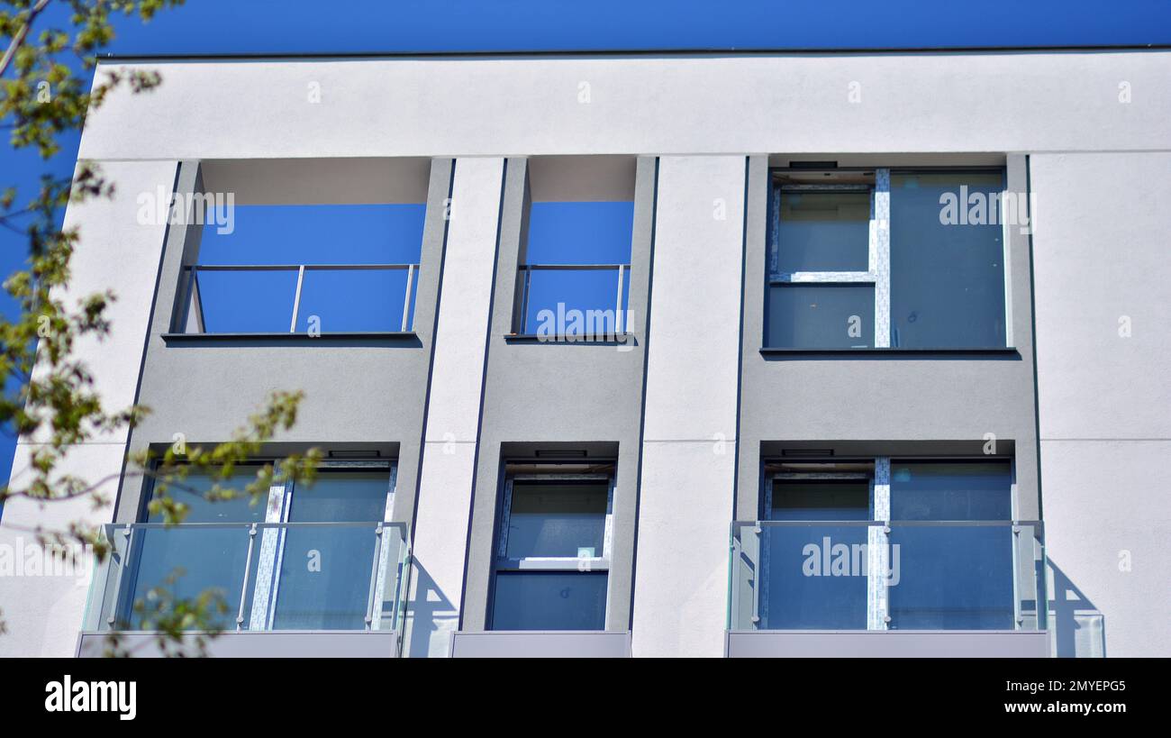 Modern residential building with new apartments in a green residential ...