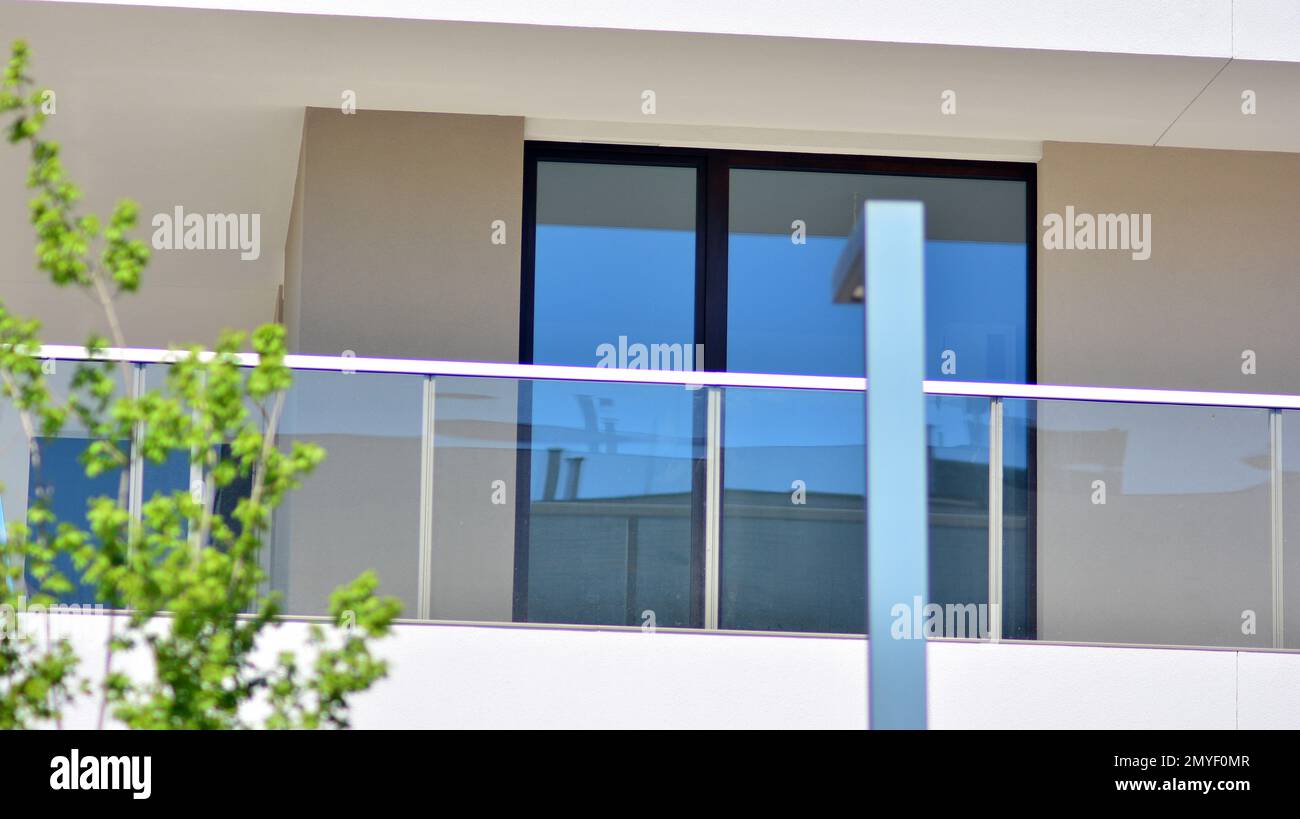 Modern residential building with new apartments in a green residential ... - Bungalows Turned Green Apartments
