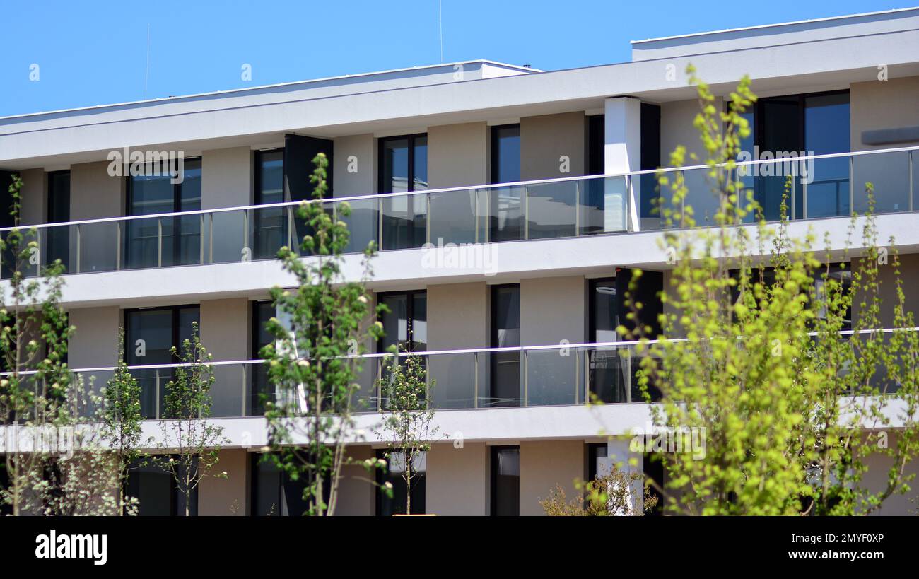 View of Modern residential building with new apartments in a green residential ...