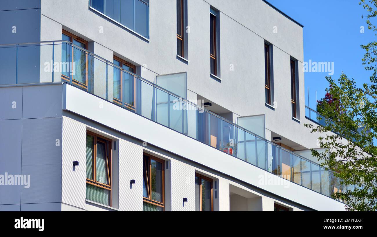 Modern residential building with new apartments in a green residential ...
