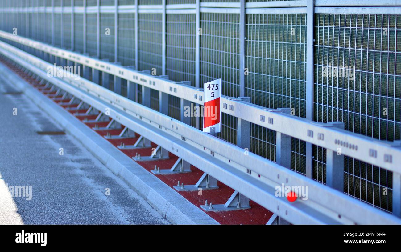 Safety barriers on the highway. Anodized safety steel barrier on
