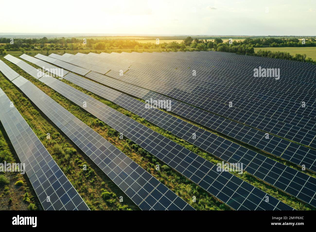 Solar panels installed outdoors, aerial view. Alternative energy source ...