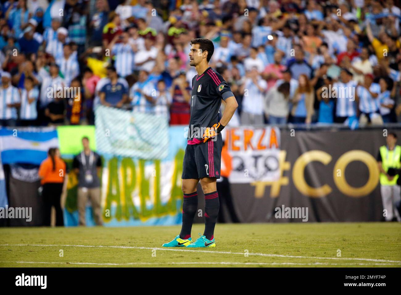 Venezuela's goalkeeper Dani Hernandez (12) stands on the field after a ...