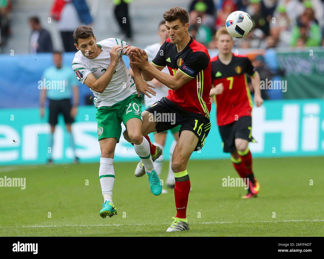 Ireland's Wes Hoolahan, left, and Belgium's Thomas Meunier go for the ball  during the Euro 2016 Group E soccer match between Belgium and Ireland at  the Nouveau Stade in Bordeaux, France, Saturday,