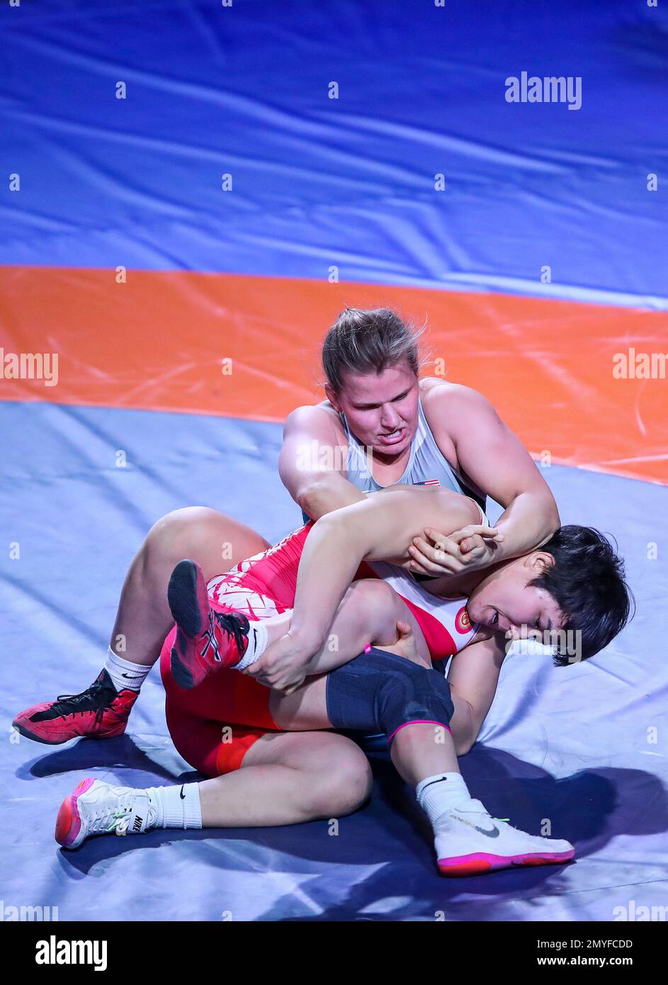 ZAGREB, CROATIA FEBRUARY 04 Aiperi Medet Kyzy of Kyrgystan (red) competes against Yelena