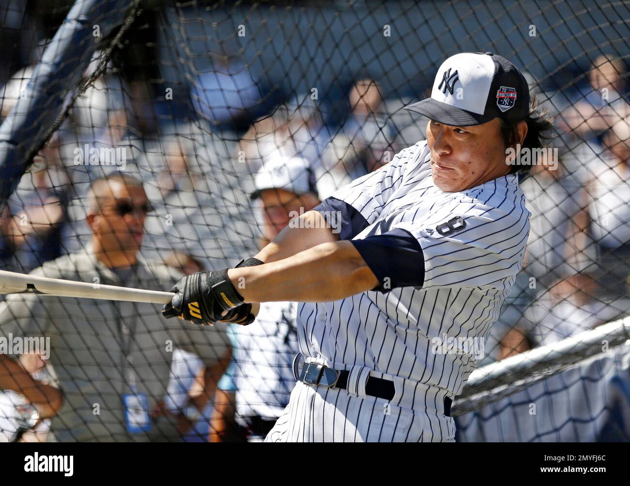 New York Yankees 2009 World Series MVP Hideki Matsui warms up in the