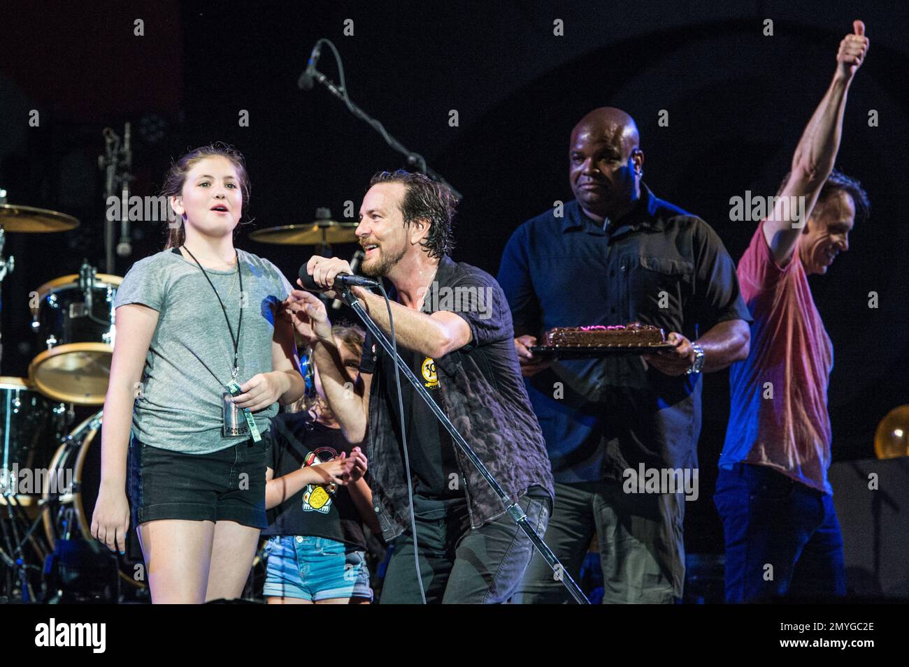 Harper Vedder, from left, Olivia Vedder, and Eddie Vedder of Pearl Jam