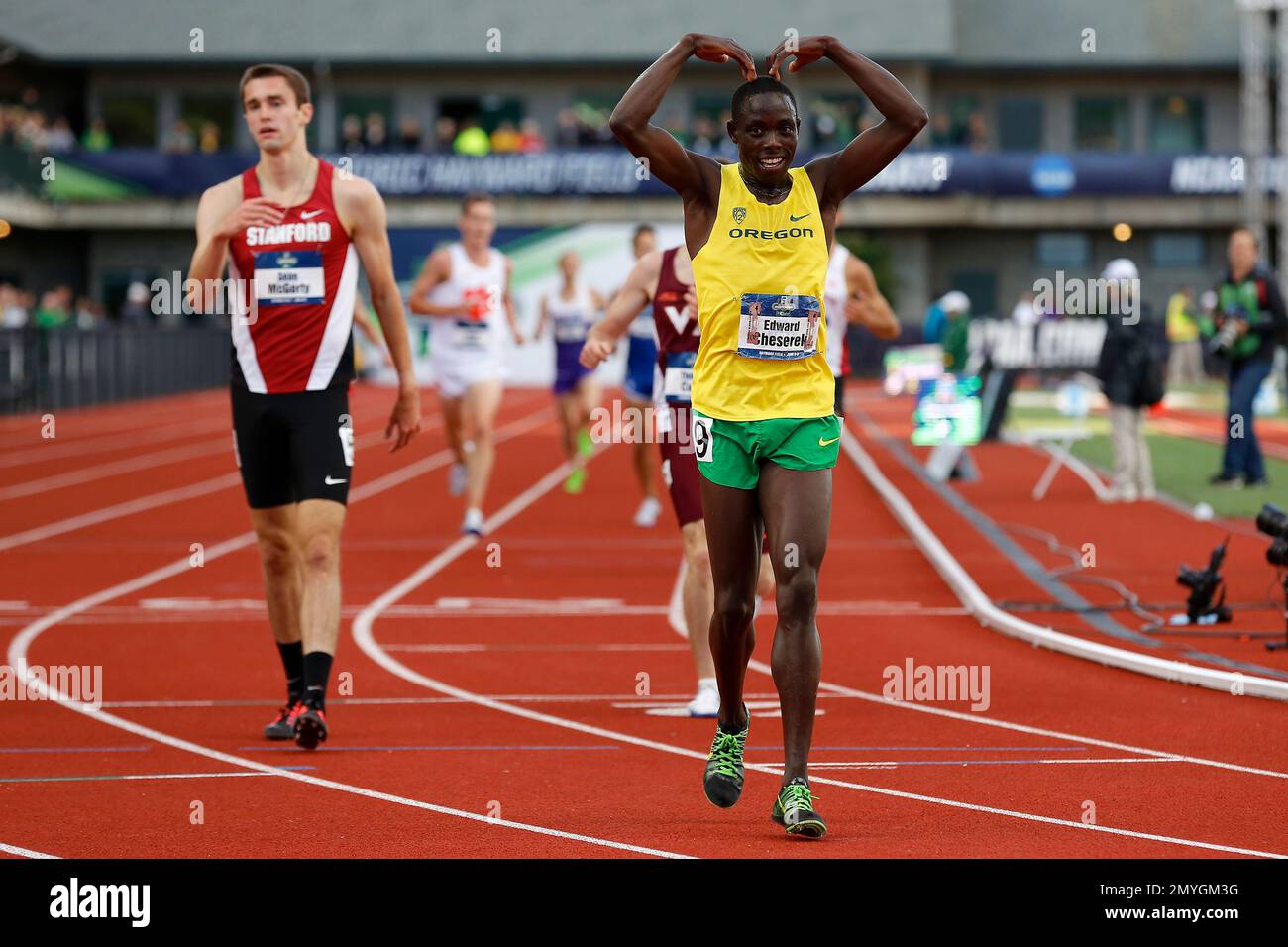 Oregon's Edward Cheserek reacts after winning the men's 5,000 meter at