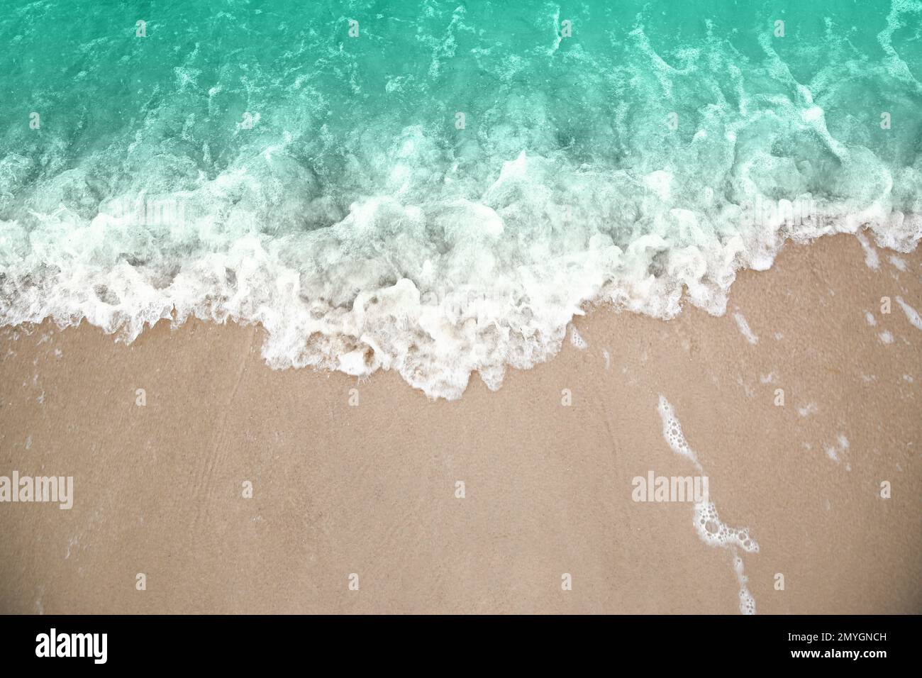 Beautiful view of sea tide on sandy beach. Summer vacation Stock Photo