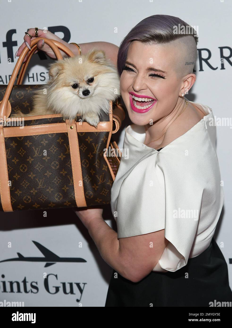 Television personality Kelly Osbourne and her dog Polly attend the