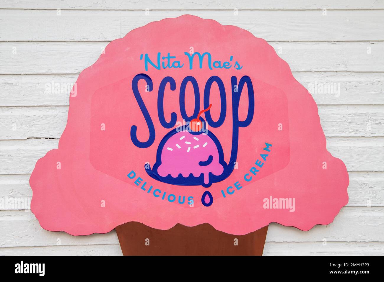 Ice cream cone sign for Nita Mae's Scoop delicious ice cream on a spring day in Marine on St