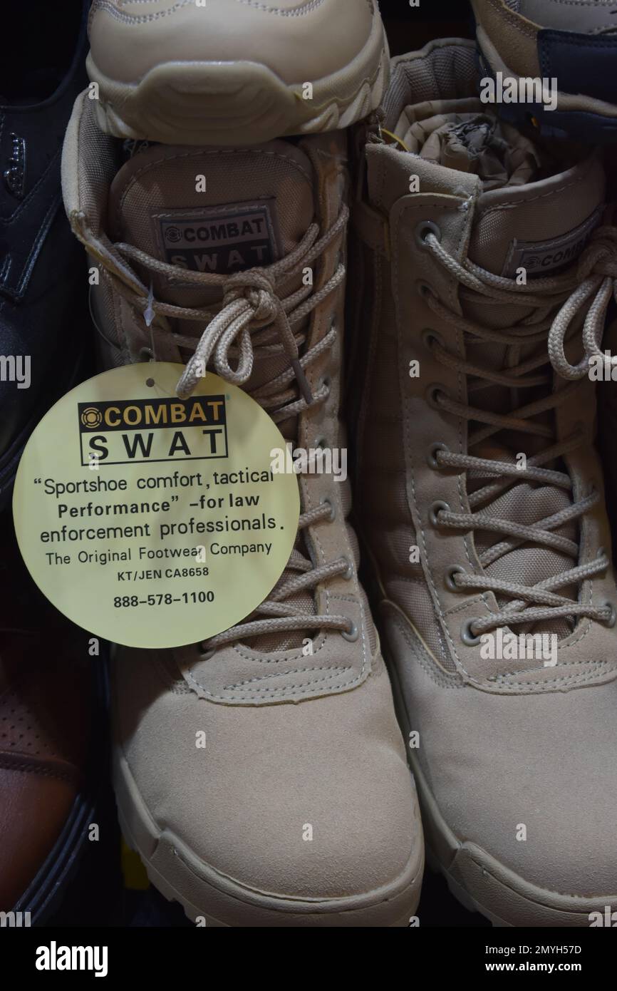Combat boots 'for law enforcement professoinals' for sale in the Duhok Souq (market) in Northern Iraq Stock Photo