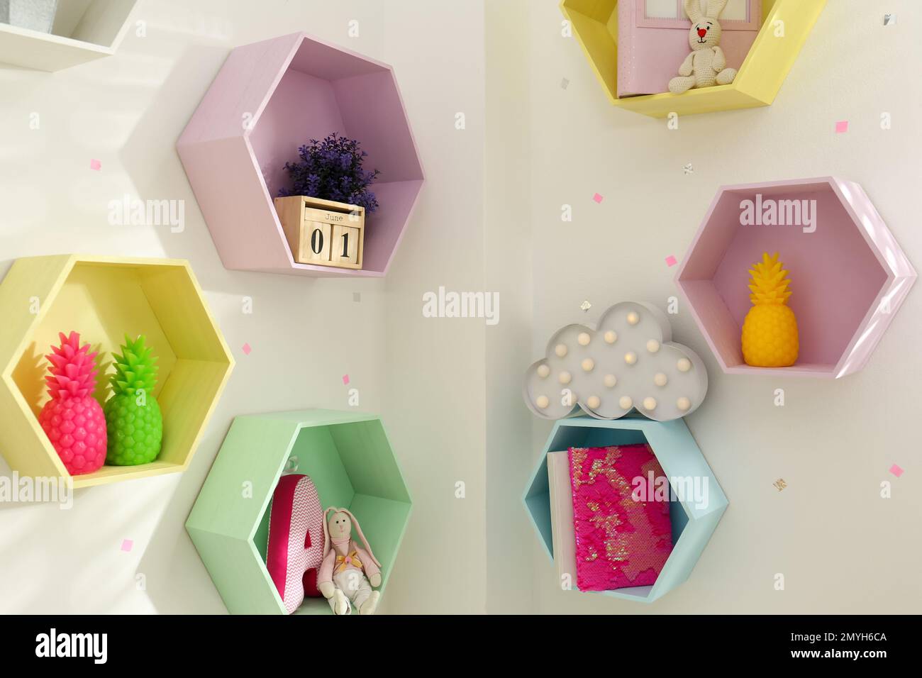 Hexagon shaped shelves on white wall. Interior design Stock Photo Alamy