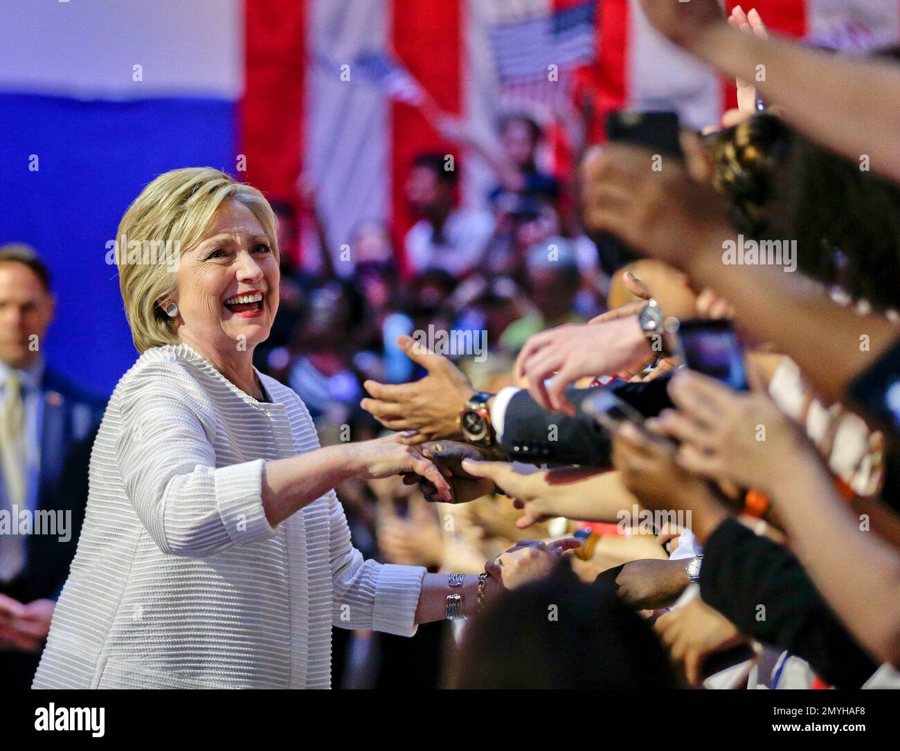 Democratic presidential candidate Hillary Clinton greets supporters as ...