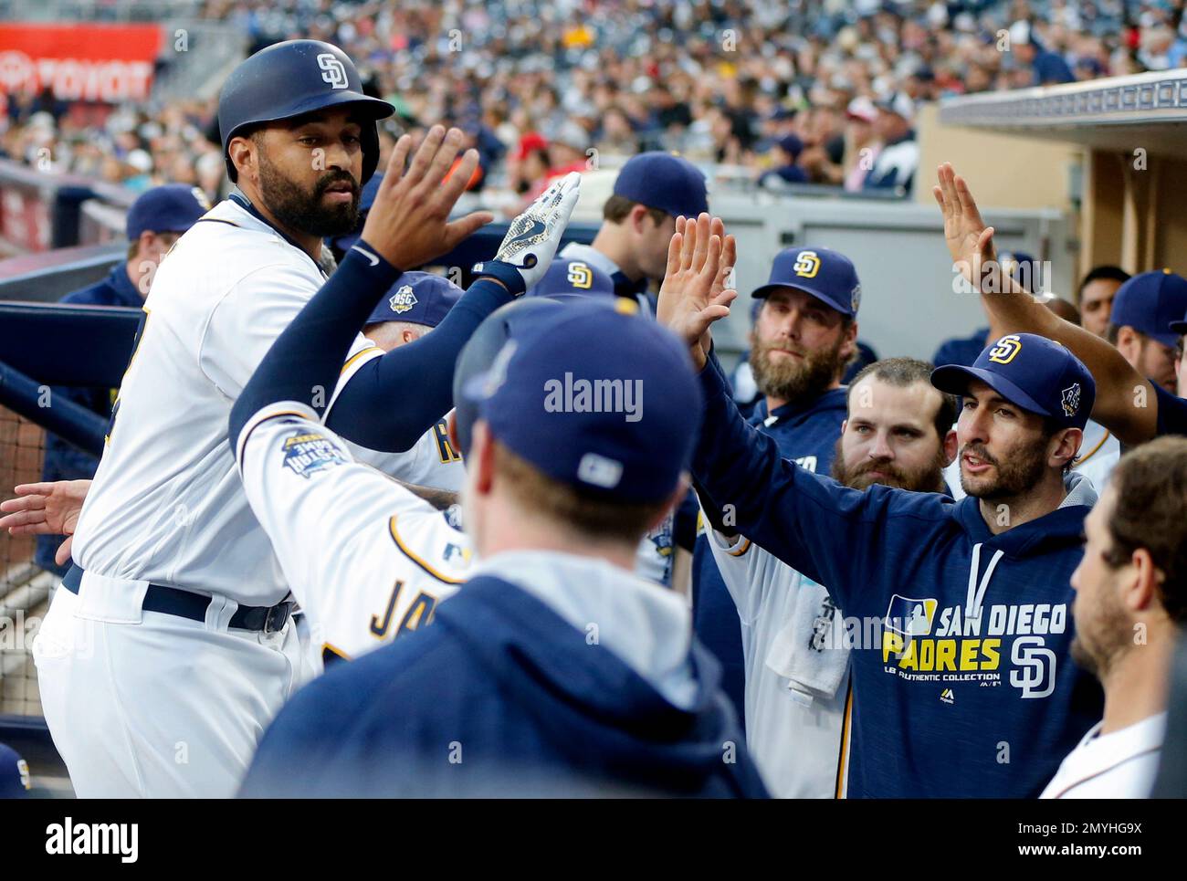 San Diego Padres outfielder Matt Kemp laughs during a news conference  introducing him as part of the baseball club Friday, Dec. 19, 2014, in San  Diego. The Padres deal for the former