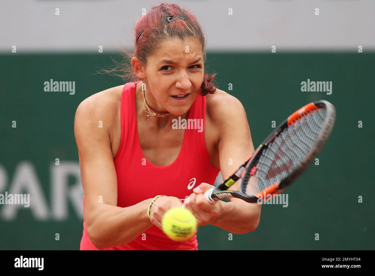 Switzerland’s Rebeka Masarova returns the ball in the girl&rsquo;s final of