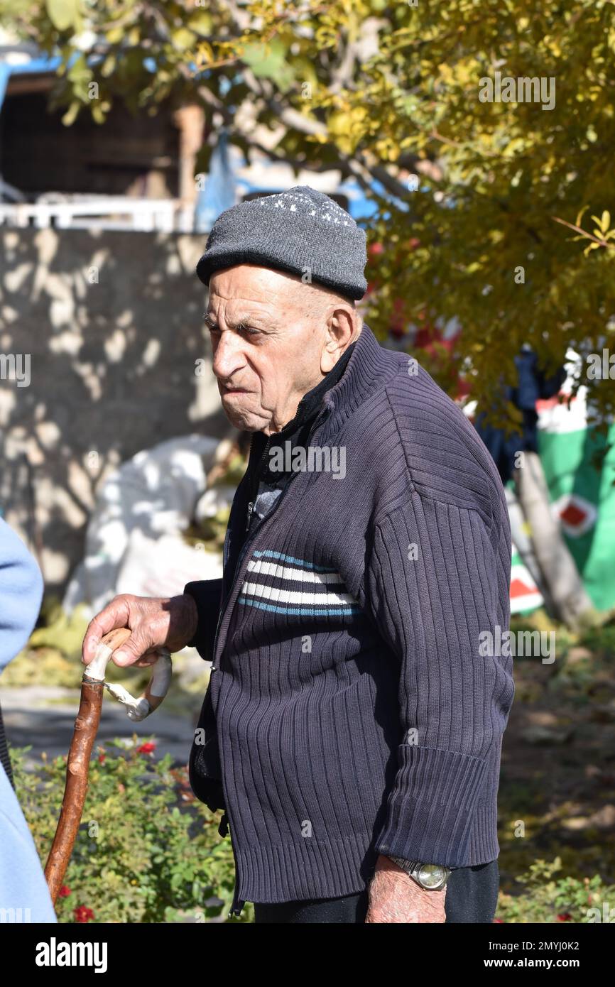 Elderly man walking cane hi-res stock photography and images - Alamy