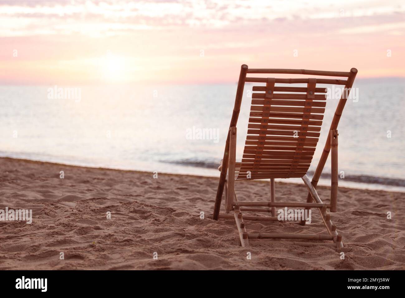Wooden deck chair on hi-res stock photography and images - Alamy