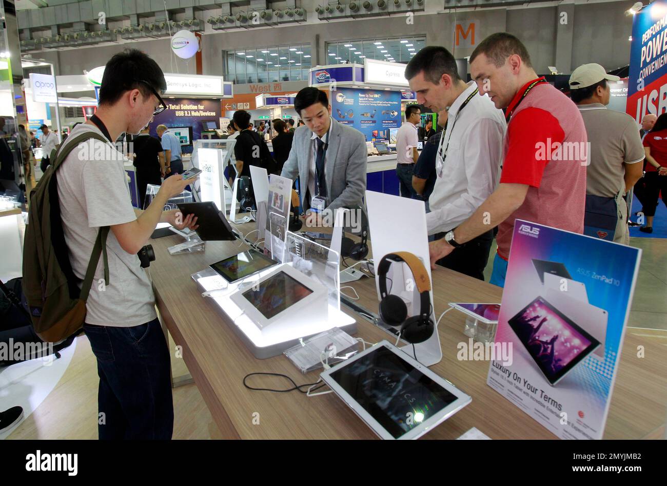 Visitors review new computer products during the Computex Taipei