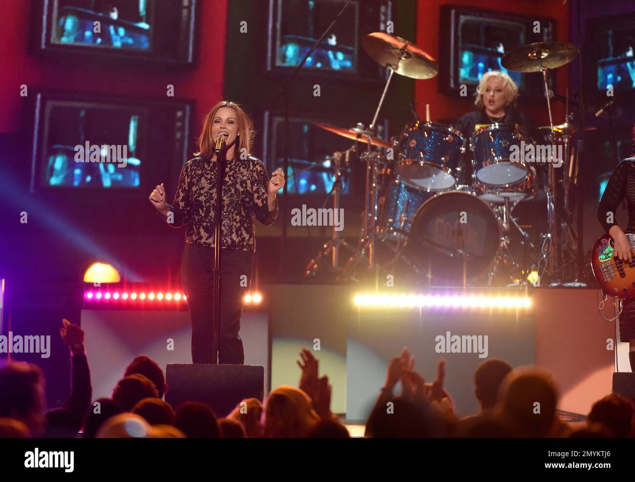 Belinda Carlisle, left, and Gina Schock, of The Go Go’s, perform “We(01)