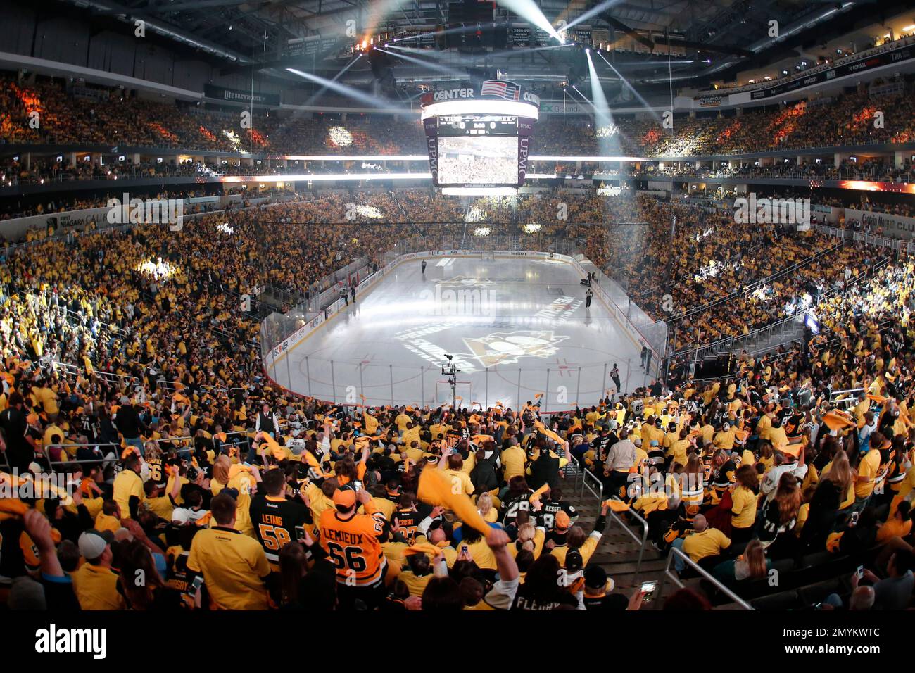The crowd waves towels and cheers as lasers and spotlights swirl over the  ice at Consol Energy Center before Game 5 of the NHL hockey Stanley Cup  Eastern Conference finals between the