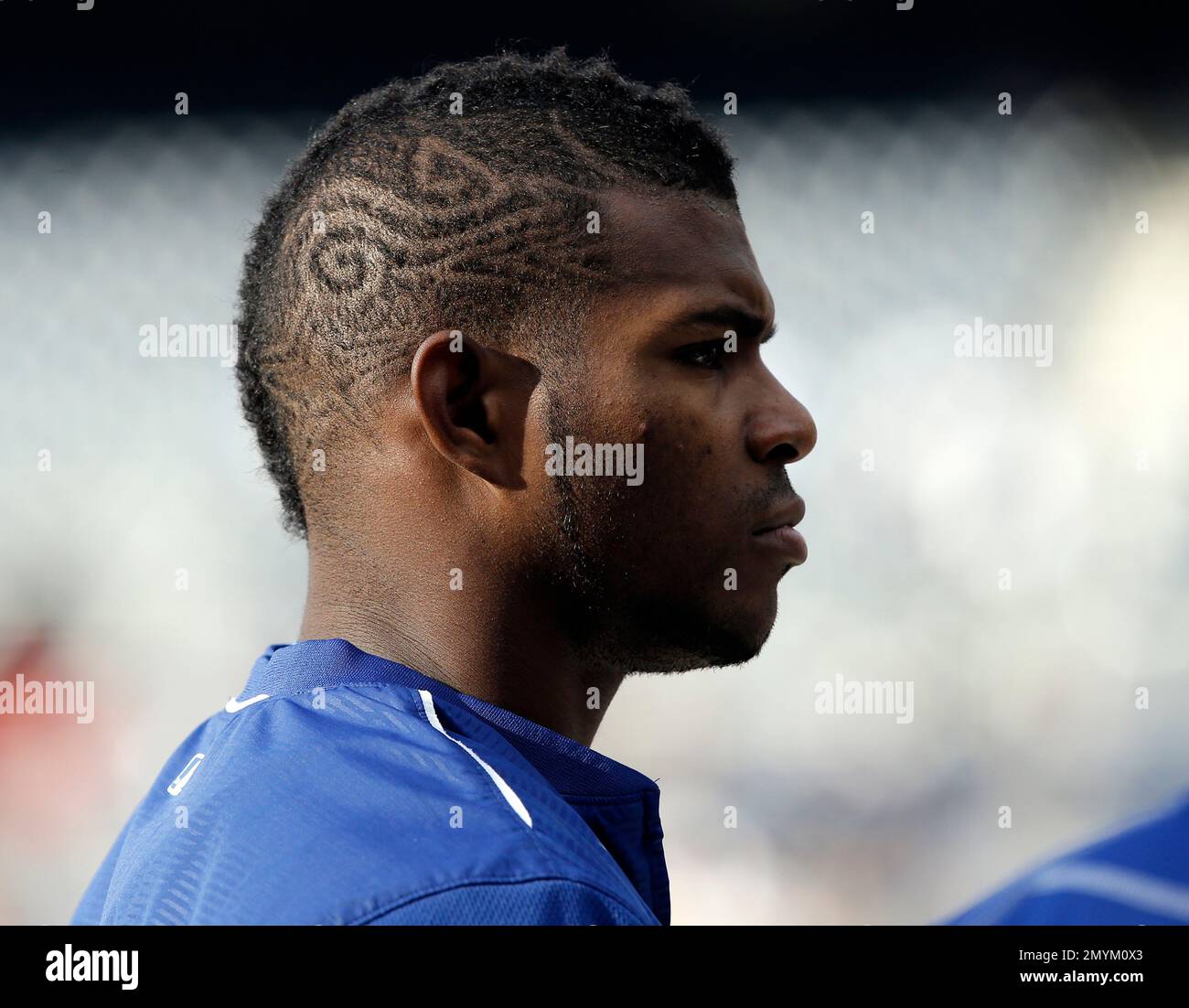Los Angeles Dodgers' Yasiel Puig waits for his turn to bat with