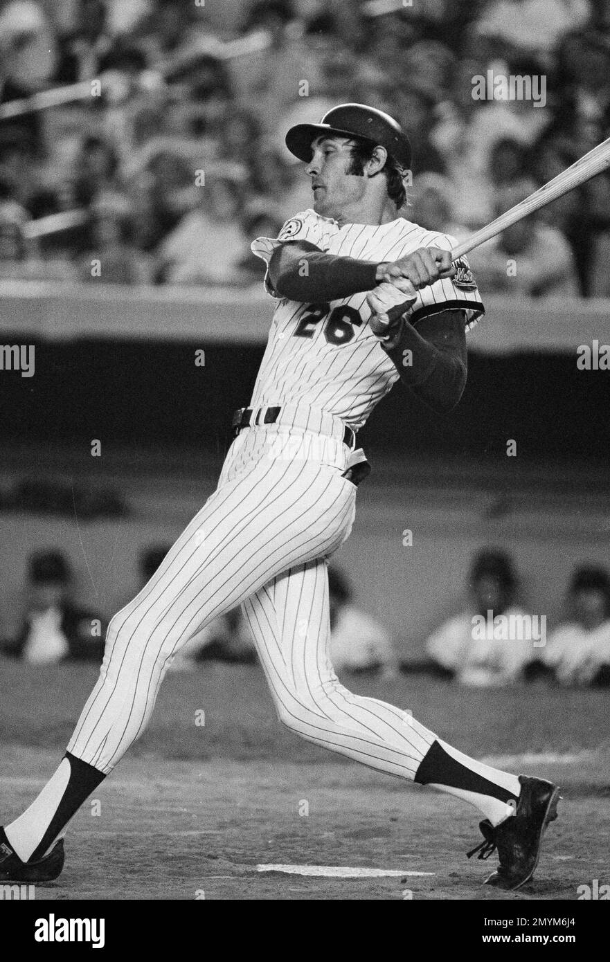 New York Mets' Dave Kingman takes a big swing at the ball during a game  with the St. Louis Cardinals, June 30, 1976, at Shea Stadium in New York.  Kingman connected with