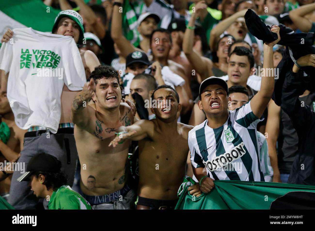 Fans of Atletico Nacional celebrate at the end of a second leg