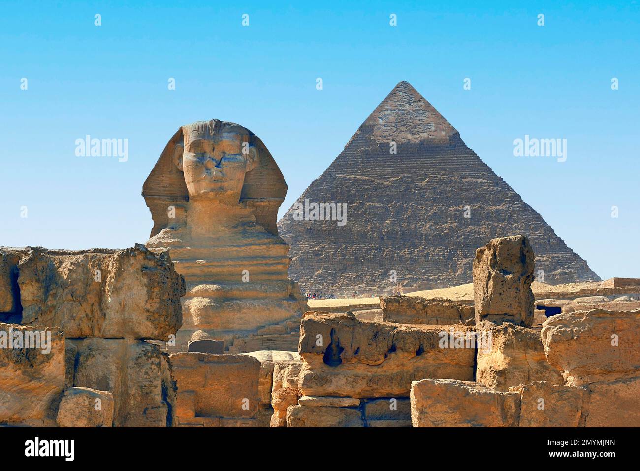 Frontal view of the head of the Sphinx of Giza, behind Cheops Pyramid, Giza, Cairo, Egypt, Africa Stock Photo