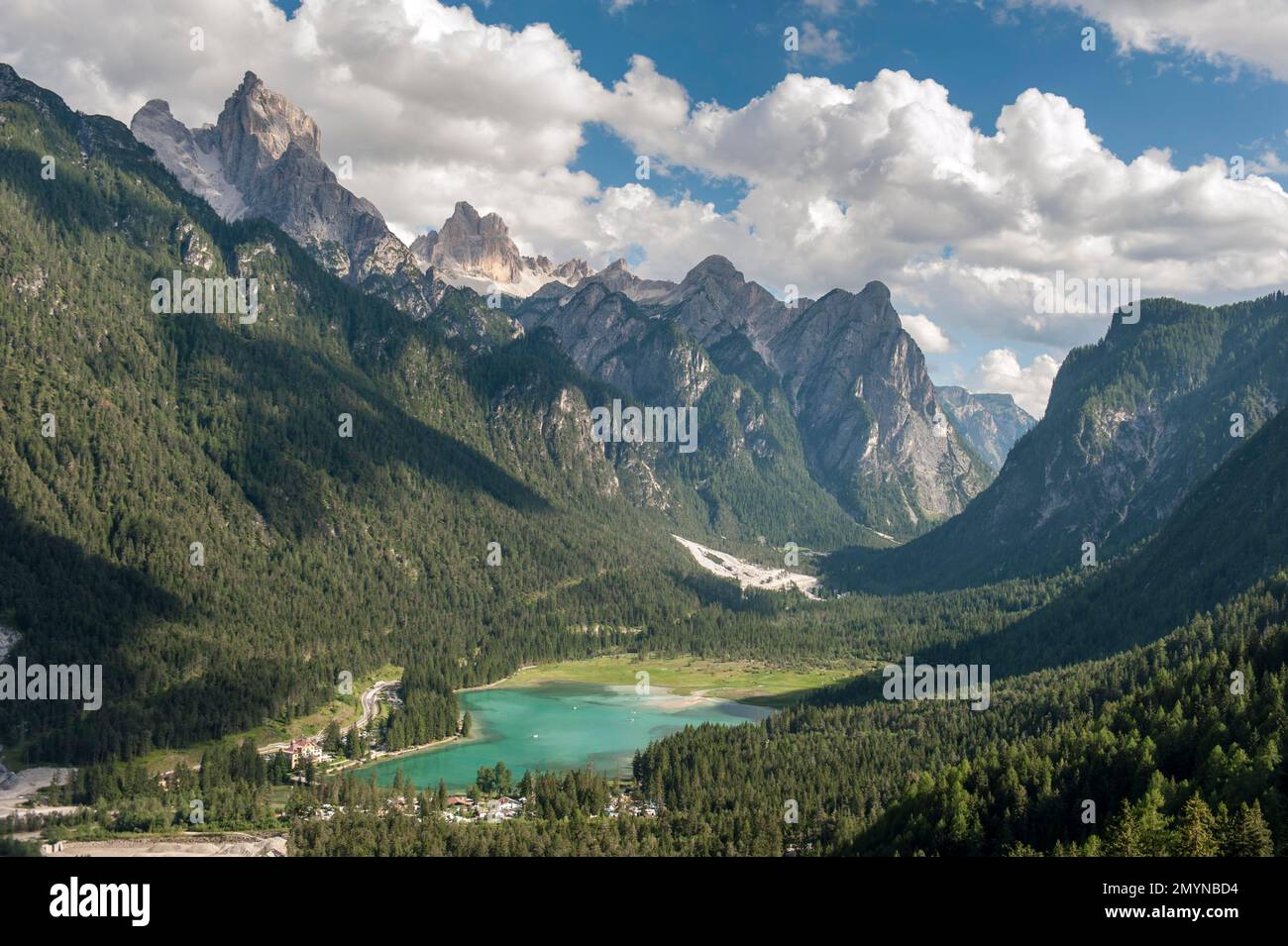 Mountain peak Birkenkofel (2922 m) left, Croda dei Baranci, Mount Nasswand (2254 m) centre-right, Croda Bagnata, Dobbiaco Lake, Dobbiaco, Cave Stone V Stock Photo