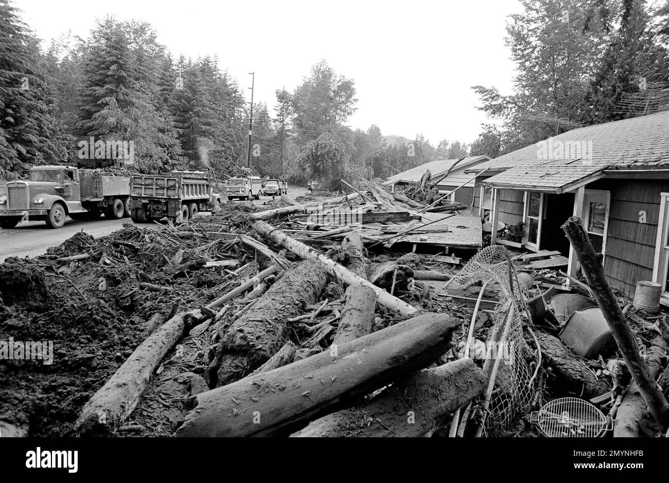 Cleanup crews begin a big job in the town of Toutle, Wash., about 20