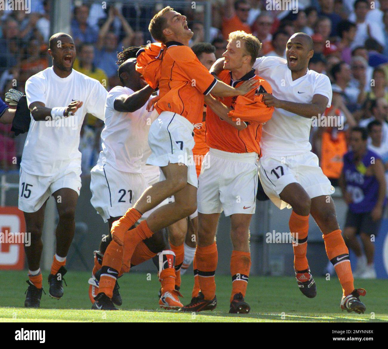 The Netherlands' Dennis Bergkamp, who scored the winning goal against Argentina, is mobbed by The Netherlands' Dennis Bergkamp, who scored the winning goal against Argentina, is mobbed by