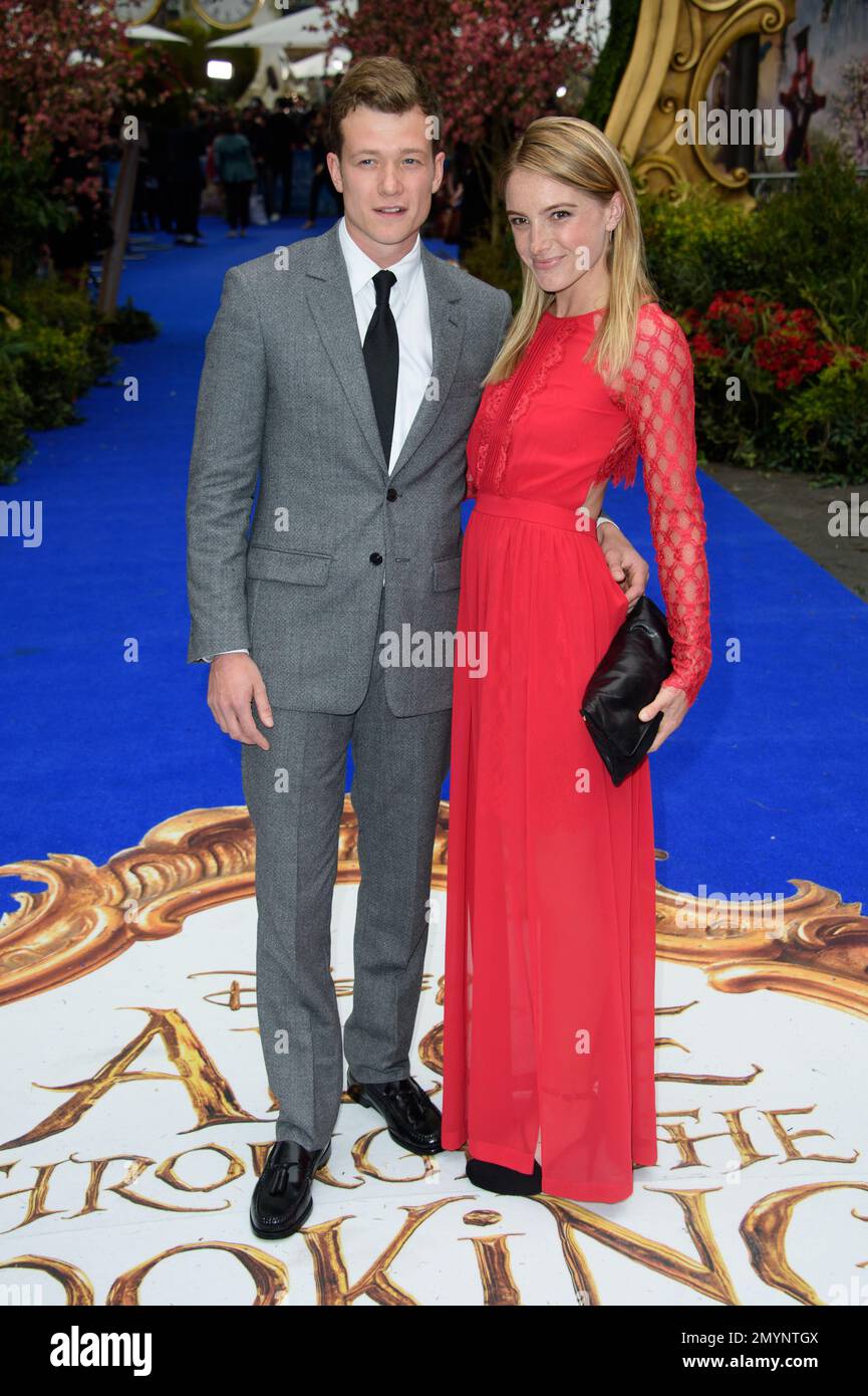 Ed Speleers and Asia Macey pose for photographers upon arrival at the European premiere of the