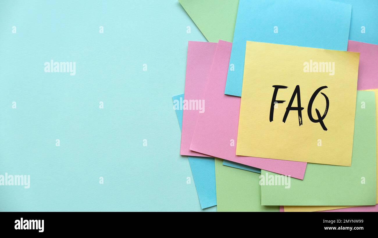 Copy space background with a multi color empty sticky paper note ...