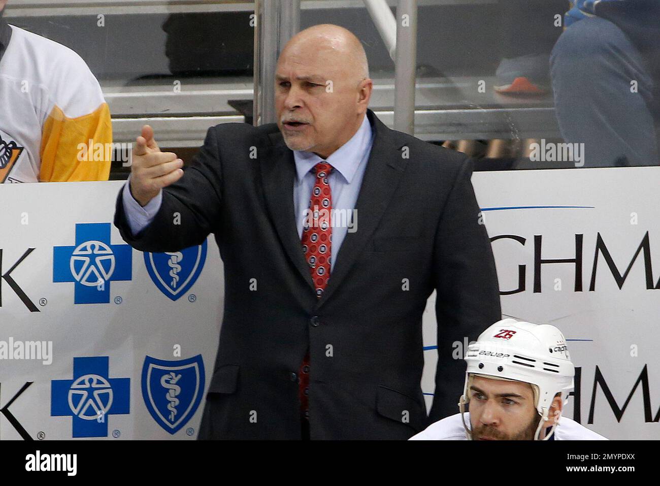 Washington Capitals head coach Barry Trotz gives instructions during
